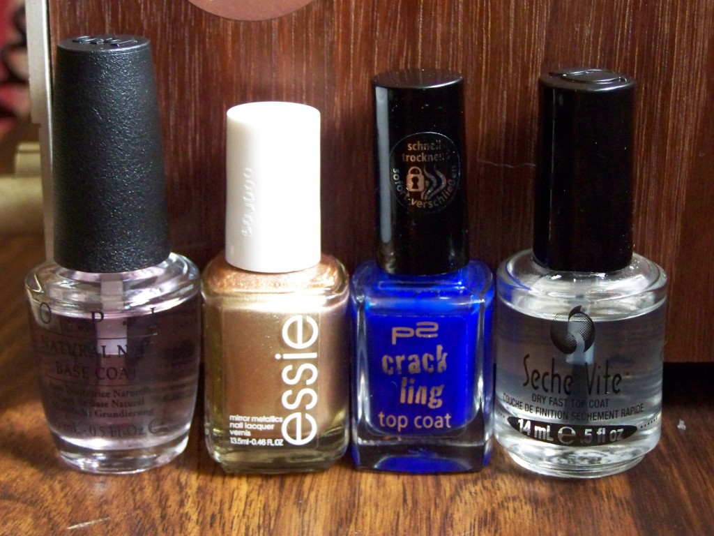 Essie's Penny Talk, P2's Crackling Top Coat in Blue Bomb. I really love that German sticker on the bottle.